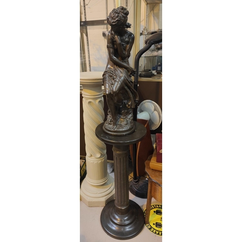 521C - A bronze effect column pedestal with female figure (figure a.f) 