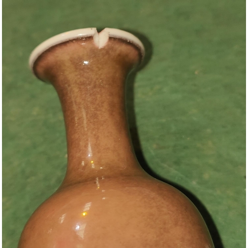 550 - A 19th century Sang de Beouf glazed vase with fitted wooden feet, six character mark to base (stand ... 