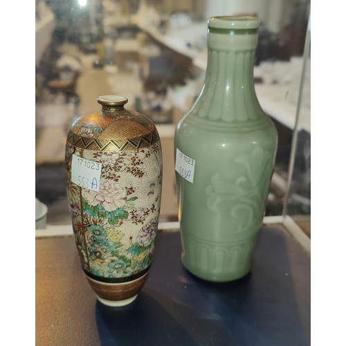 553A - A Chinese celadon glaze vase with raised decoration and border decoration, ht. 16cm; a Japanese Meij... 