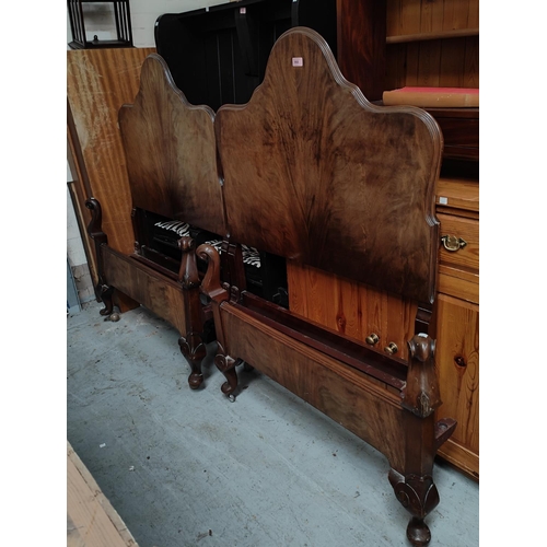 968 - A pair of walnut 3ft single beds with shaped headboard and knurled foot