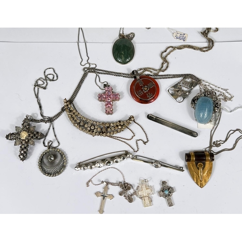 740 - Vintage costume jewellery including a hallmarked silver pierced pendant, an openwork cross, a silver... 