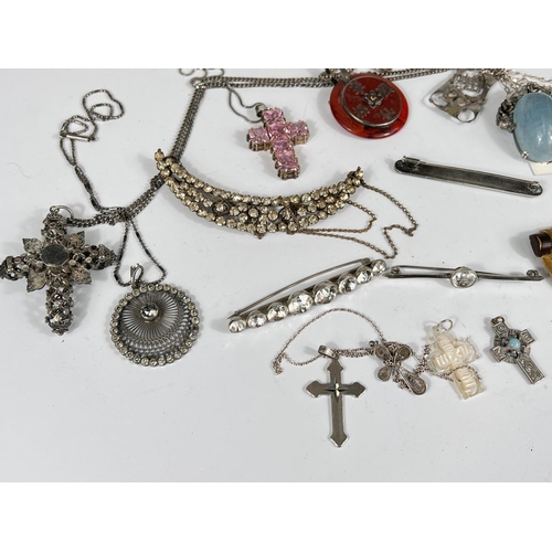 740 - Vintage costume jewellery including a hallmarked silver pierced pendant, an openwork cross, a silver... 