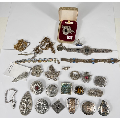 741 - Vintage costume jewellery including pewter and other brooches, filigree brooches, bracelets, an enam... 