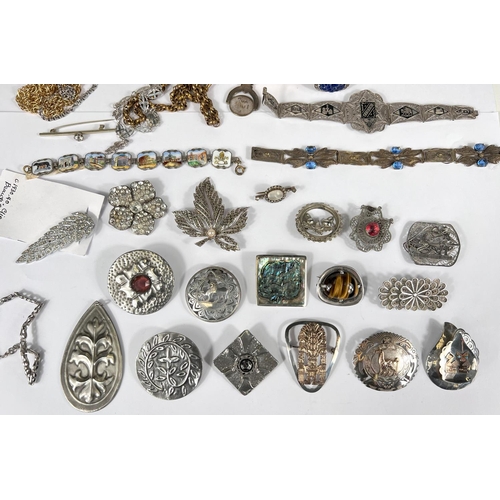 741 - Vintage costume jewellery including pewter and other brooches, filigree brooches, bracelets, an enam... 