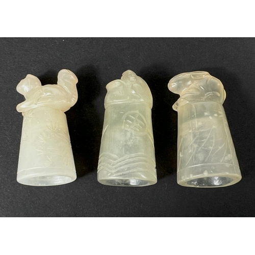 744 - Three Chinese pale jade coloured carved hardstone 