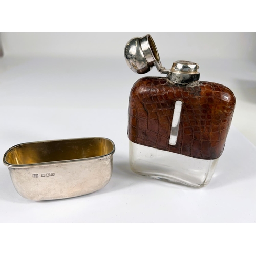 764 - A hall marked silver and leather hip flask with hall marked detachable cup, three silver salts (all ... 