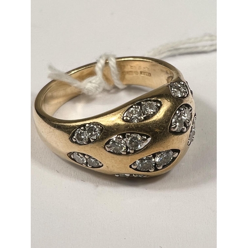 668 - An 18 carat hallmarked gold dress ring set with pairs of diamonds in 12 lozenge shaped insets, 24 di... 