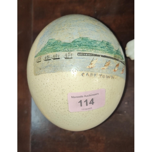 114 - A 19th century ostrich egg scrimshaw work depicting ships in Cape Town harbour