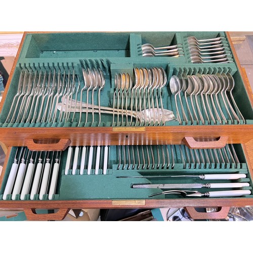 650A - A hallmarked silver canteen of rat tail cutlery, 12 settings, and 3 piece carving set, the knives wi... 