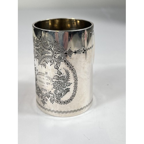 634 - A Victorian hallmarked silver presentation cup etched dedication and decoration, 3.6oz