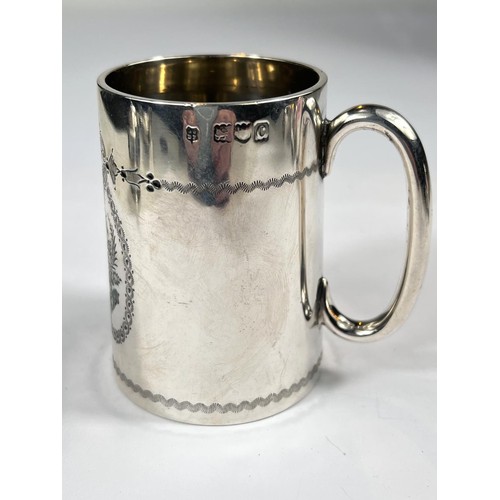 634 - A Victorian hallmarked silver presentation cup etched dedication and decoration, 3.6oz