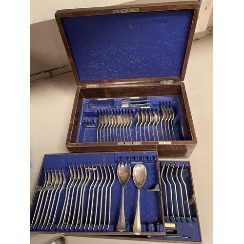 633 - A large oak canteen of silver plated cutlery, hinged lid and two drawers below; a smaller similar