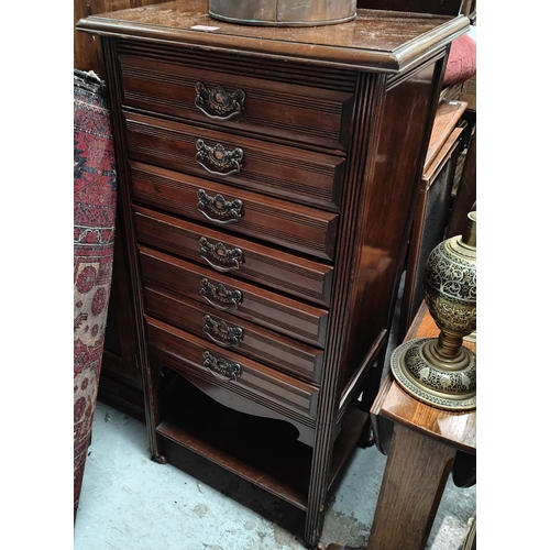 1014 - An Edwardian 7 height mahogany music cabinet with shelf under (breakfront)