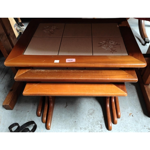 1030 - A nest of three 1970's tile top occasional tables.