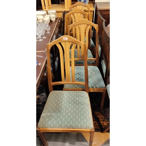 963 - Four modern teak dining chairs