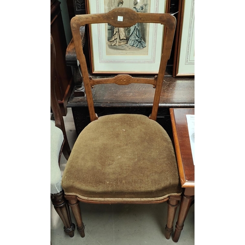 972 - A mahogany inlaid armchair with vase decoration to back, another inlaid chair