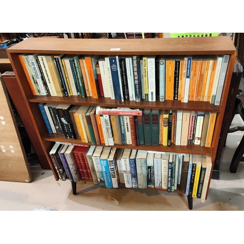 980 - A mid 20th century teak three height bookcase on ebonised legs