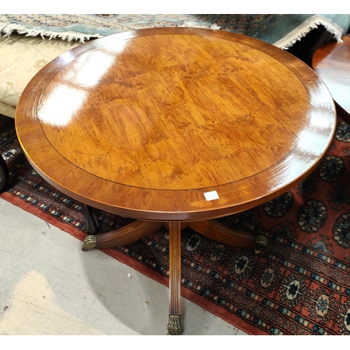 991A - A reproduction circular occasional table with four splay feet