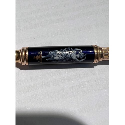 640 - A 19th century propelling pencil in gilt and deep blue enamel with classical decoration of a female ... 