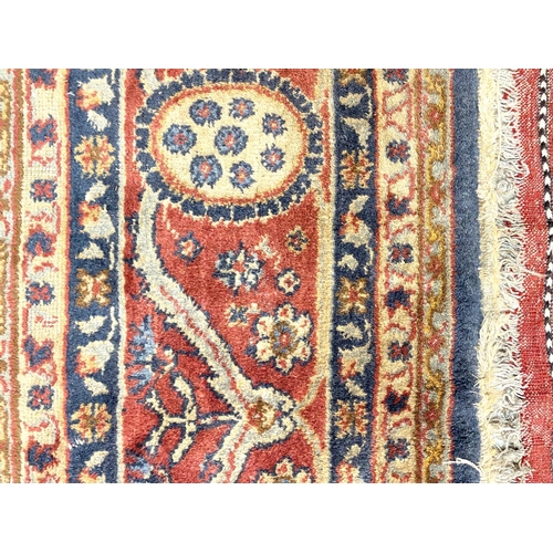 880 - An old Turkey carpet, worn, 380 x 290cm