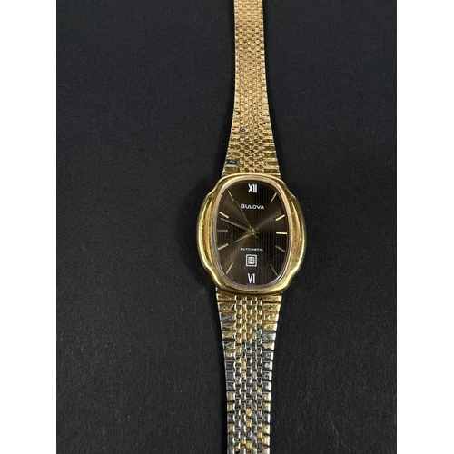 561D - BULOVA: a vintage gold plated automatic watch with brown dial, gold hands, seconds sweep and baton m... 