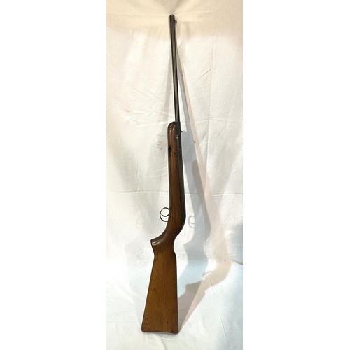 372 - A vintage air rifle, wooden stack, stamped 2030002