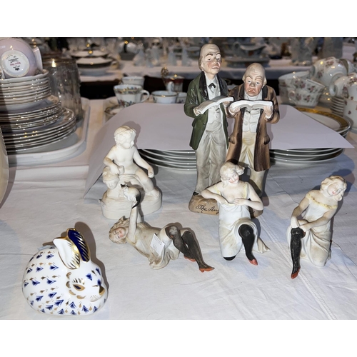 444 - Three bisque figures of girls in nightwear; a Royal Crown Derby paperweight; etc.