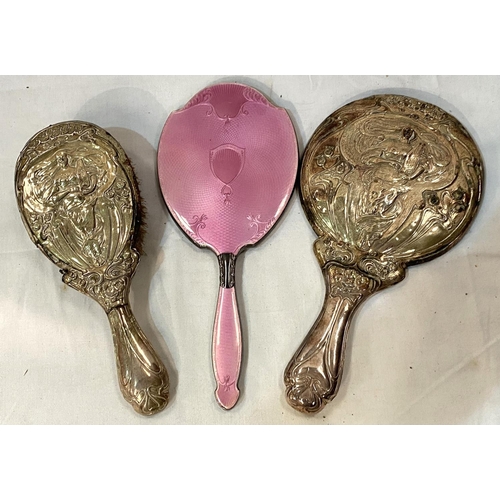 46 - An Art Nouveau embossed mirror and brush (a.f) and a  hall mark silver and pink enamel hand mirror