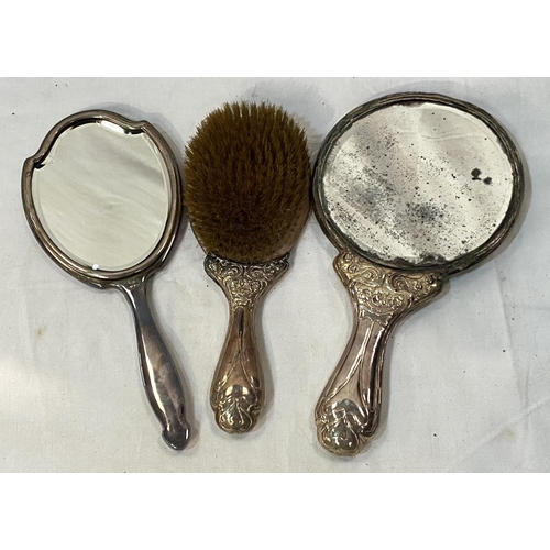 46 - An Art Nouveau embossed mirror and brush (a.f) and a  hall mark silver and pink enamel hand mirror