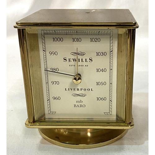 49 - A 4 face desk timepiece by Sewells of Liverpool: clock, thermometer, barometer and hygrometer