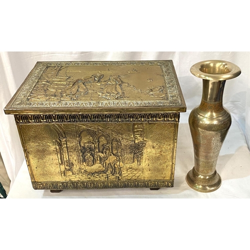 50 - An embossed brass log box; a Benares brass vase