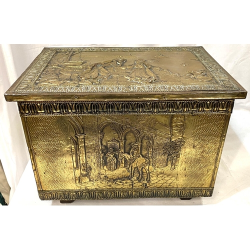 50 - An embossed brass log box; a Benares brass vase