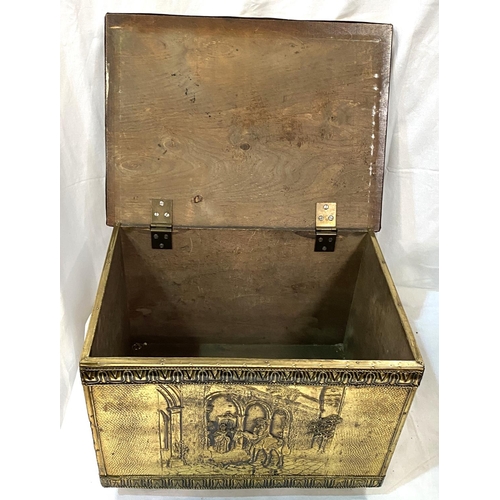 50 - An embossed brass log box; a Benares brass vase