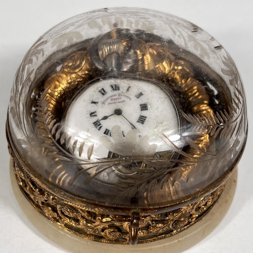 601 - An early 20th century open face keyless silver pocket watch with visible escapement in domed glass a... 