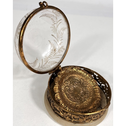 601 - An early 20th century open face keyless silver pocket watch with visible escapement in domed glass a... 