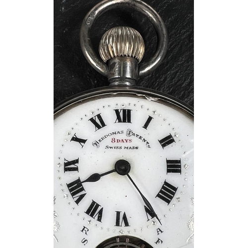 601 - An early 20th century open face keyless silver pocket watch with visible escapement in domed glass a... 