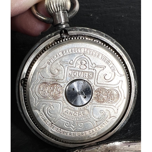 601 - An early 20th century open face keyless silver pocket watch with visible escapement in domed glass a... 