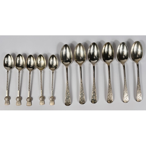 611 - A set of 6 spoons, Sheffield 1901, and a partial set of 5 teaspoons with thistle motif, Birmingham 1... 