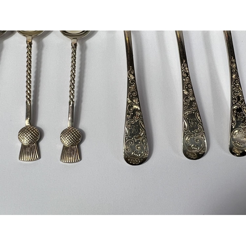 611 - A set of 6 spoons, Sheffield 1901, and a partial set of 5 teaspoons with thistle motif, Birmingham 1... 