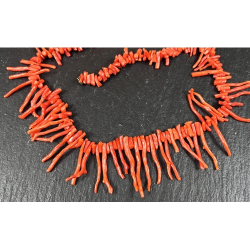 616 - Two coral necklaces, one with gilt clasp