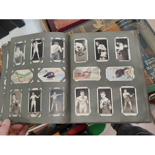 122 - A large collection of cigarette cards in albums and some loose