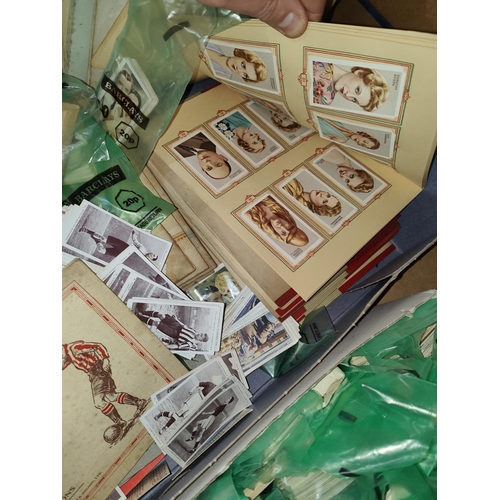 122 - A large collection of cigarette cards in albums and some loose