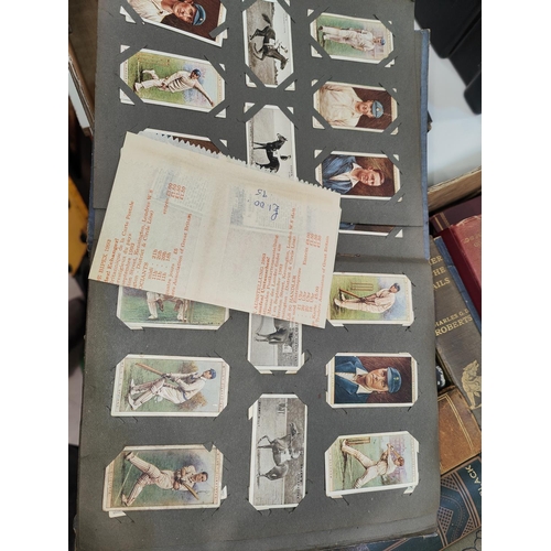 122 - A large collection of cigarette cards in albums and some loose