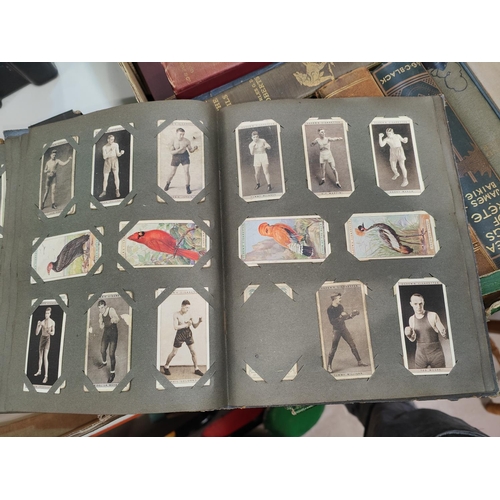 122 - A large collection of cigarette cards in albums and some loose