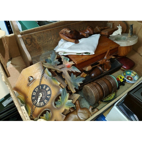 75 - A selection of carved treen; a cuckoo clock; etc.