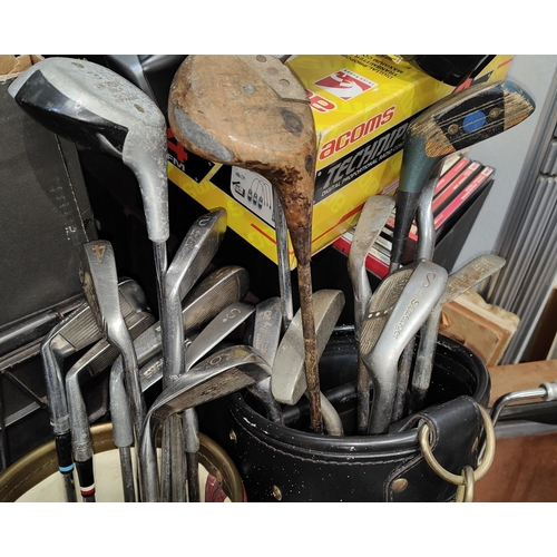 84 - Two bags of golf clubs