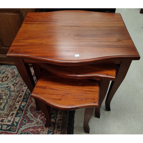 889 - A dwarf period style mahogany two tier wash stand with two small drawers and a raised back;  a ... 