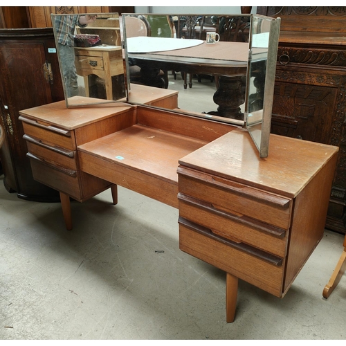 897 - A 1970's G-Plan style teak 7 drawer dressing table