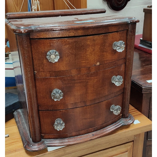 902 - A three height mahogany apprentice chest with glass handles