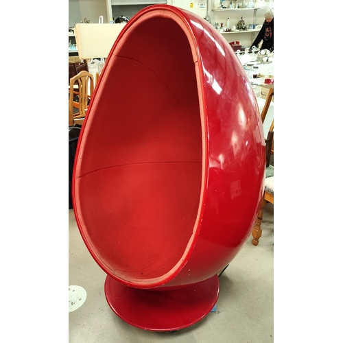 905 - After Henrik Thor Larsen, a mid 20th century swivel 'Egg Chair' in red